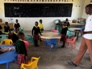 Kenyan students in educational setting within classroom.